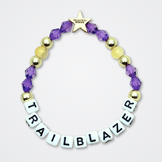 Broadway Stacks CAMPAIGN Collection. 5 stretch bracelets included in Stack. Purple, yellow, teal and gold colored beads. Letter beads that spell quotes. Gold star logo bead to remind you that you shine. Suffs fans. 