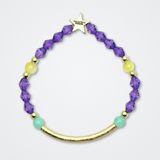 Broadway Stacks CAMPAIGN Collection. 5 stretch bracelets included in Stack. Purple, yellow, teal and gold colored beads. Letter beads that spell quotes. Gold star logo bead to remind you that you shine. Suffs fans. 