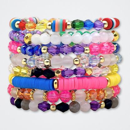 Broadway Stacks PRIDE collection. Available in 8 designs. Rainbow - Red, orange, yellow, green, blue, purple, pink, white, grey, black and gold colored beads. Broadway Stacks gold star logo bead to remind you that You Shine.