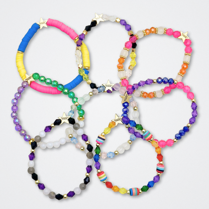 Broadway Stacks PRIDE collection. Available in 8 designs. Rainbow - Red, orange, yellow, green, blue, purple, pink, white, grey, black and gold colored beads. Broadway Stacks gold star logo bead to remind you that You Shine.