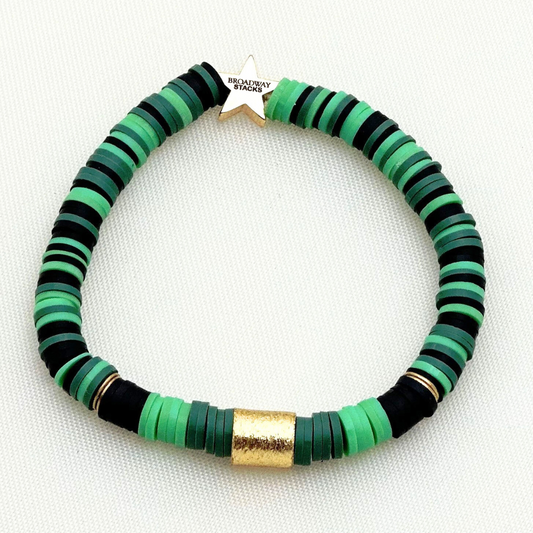 Broadway Stacks Witch collection. 3 stretch bracelets included in Stack. Greens, pinks, black and gold colored beads. Letter beads that spell Wicked. Gold star logo bead on every bracelet. 