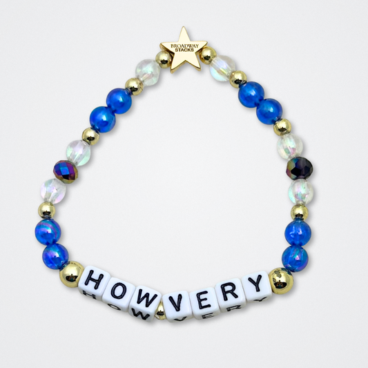 Broadway Stacks CORN NUTS Collection. 5 stretch bracelets included in Stack. Red, yellow, green, blue, black and gold colored beads. Letter beads that spell quotes. Gold star logo bead to remind you that you shine. Heathers the Musical fans.