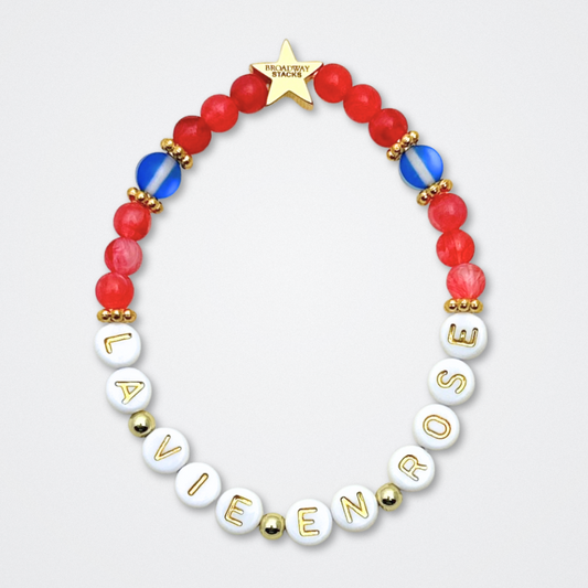 Broadway Stacks JAZZY Collection. 5 stretch bracelets included in Stack. Red, blue, black and gold colored beads. Letter beads that spell quotes. Gold star logo bead to remind you that you shine. Wonderful World musical and Louis Armstrong fans.
